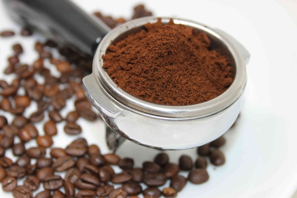 Ground coffee with whole coffee beans